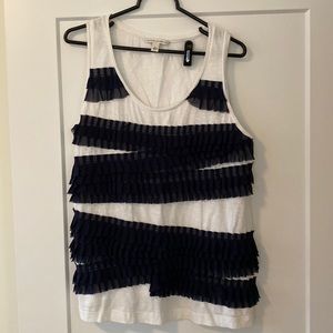 Banana Republic sleeveless top with ruffle accent in front, Size L.
